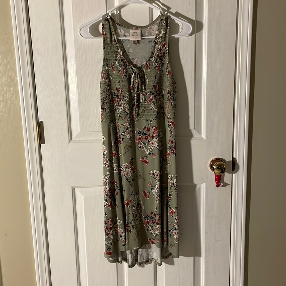 Green summer dress with floral design
